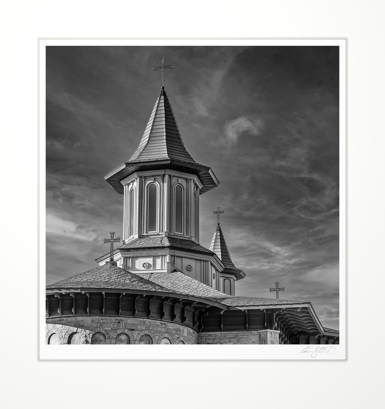 Monastery steeple against clouds